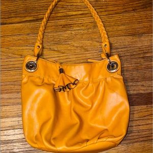 Brand is Kelly and Katie, it is one size fits all, and it is a mustard yellow.